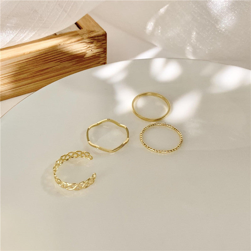 Korean Simple Ins Wind Twist Wave Four-piece Combination Ring Female Personality Ring Tail Ring